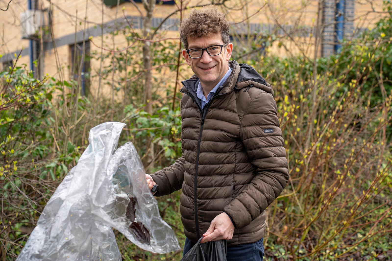 Tim Shearman holding bin liners.
